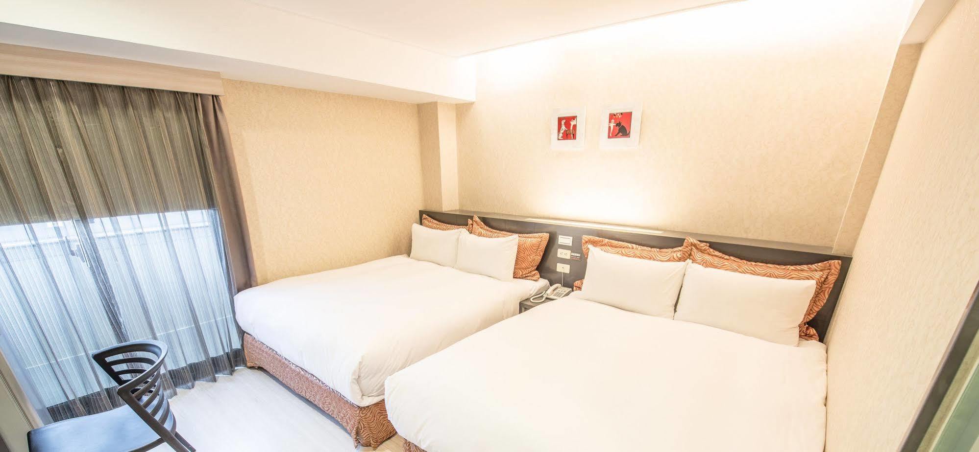 Wecan Hotel Гаосюн Екстер'єр фото